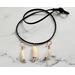 Alligator Teeth (provided) with Polymer Clay and Copper on suede cord